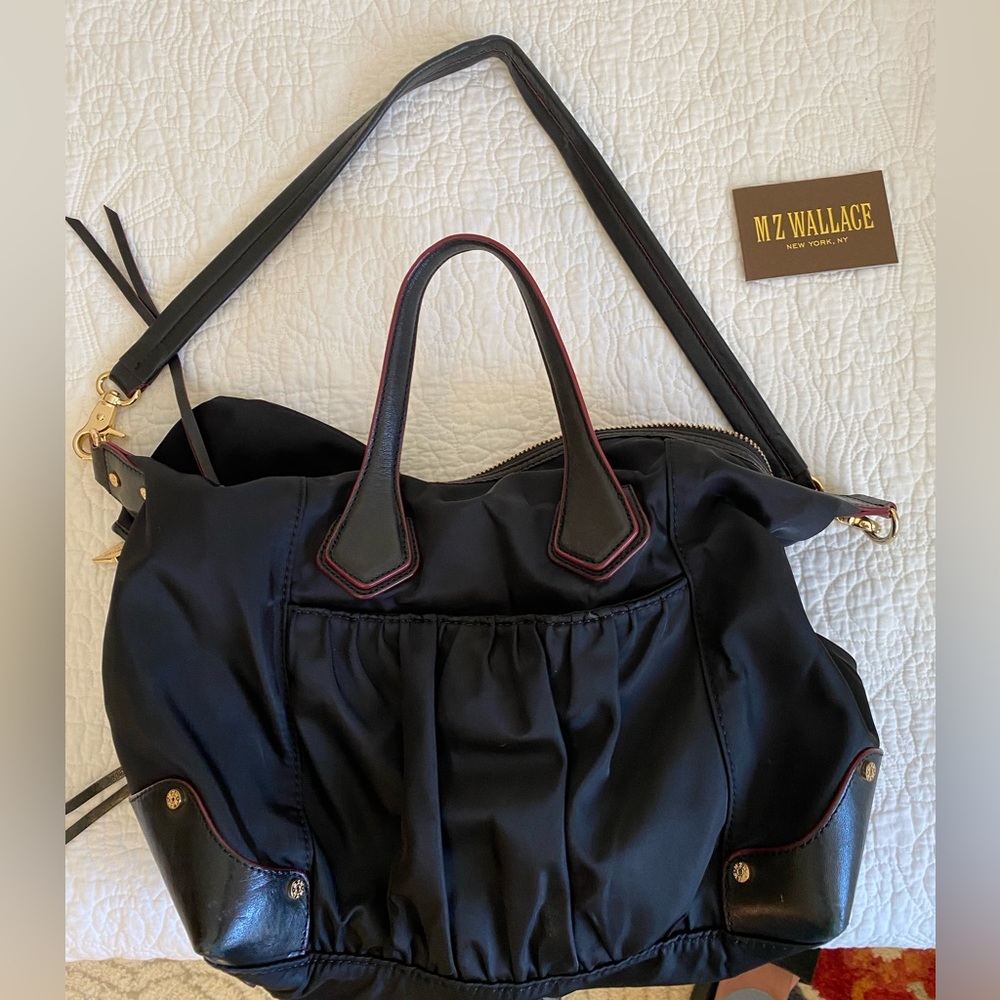 MZ Wallace handbag.Black w/ gold hardware. Small change purse included.